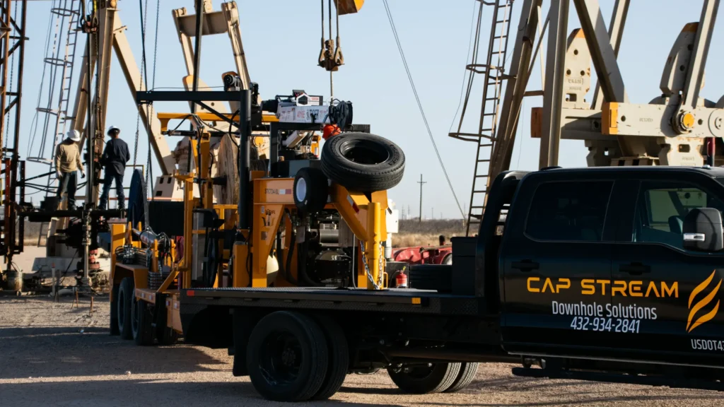 Capstream Downhole Solutions' expert team performing safe cable spooling